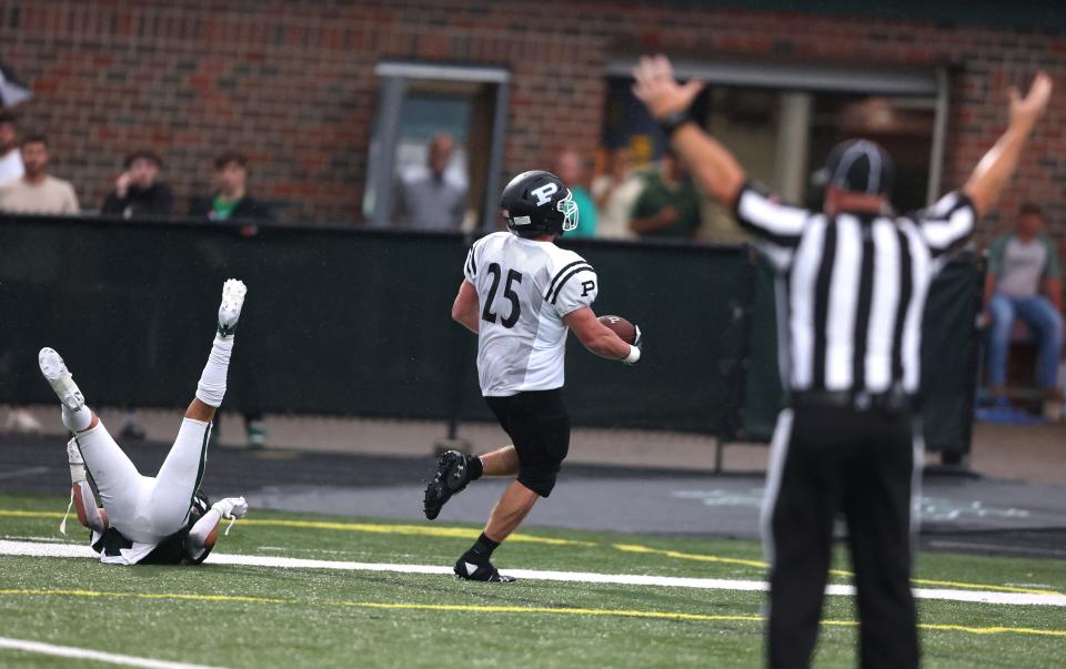 Perry's Ryder Hartshorn scores a first-half TD at Central Catholic last Thursday.