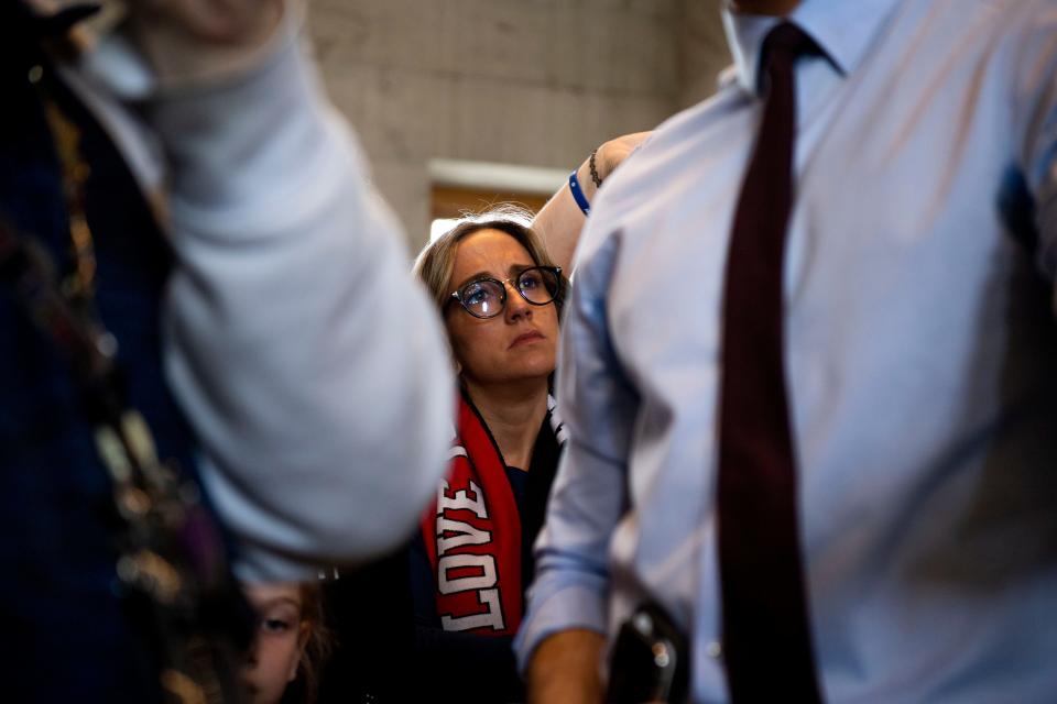 Covenant Parent, Sarah Shoop Neumann, listens as Rep. Justin Pearson, D-Memphis, speaks to protesters after the House voted in SB 1325 at the Tennessee Capitol in Nashville, Tenn., Tuesday, April 23, 2024.