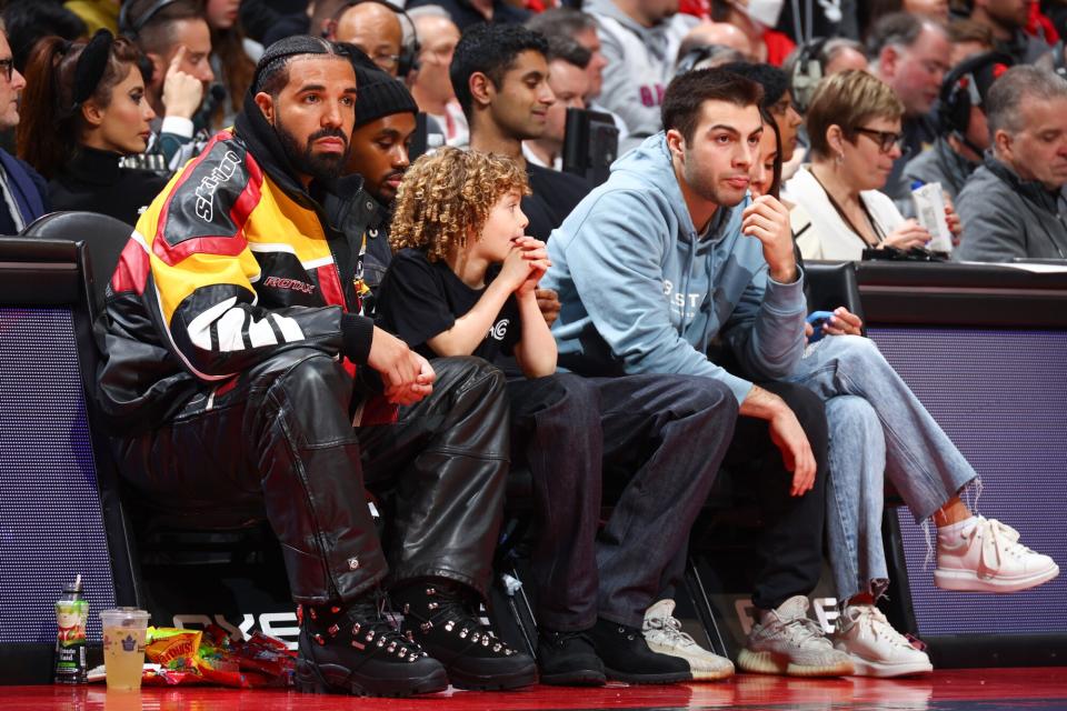 Artist Drake looks on during the game against the LA Clippers and Toronto Raptors on December 27, 2022 at the Scotiabank Arena in Toronto, Ontario, Canada.