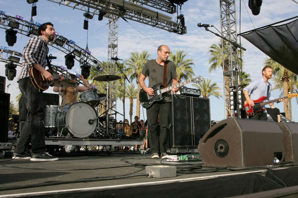 INDIO, CA - APRIL 18:  (L-R) Musicians Dan Hoerner, William Goldsmith, Jeremy Enigk and Nate Mendel of the band Sunny Day Real Estate perform during day three of the Coachella Valley Music & Arts Festival 2010 held at the Empire Polo Club on April 18, 2010 in Indio, California.  (Photo by Karl Walter/Getty Images)