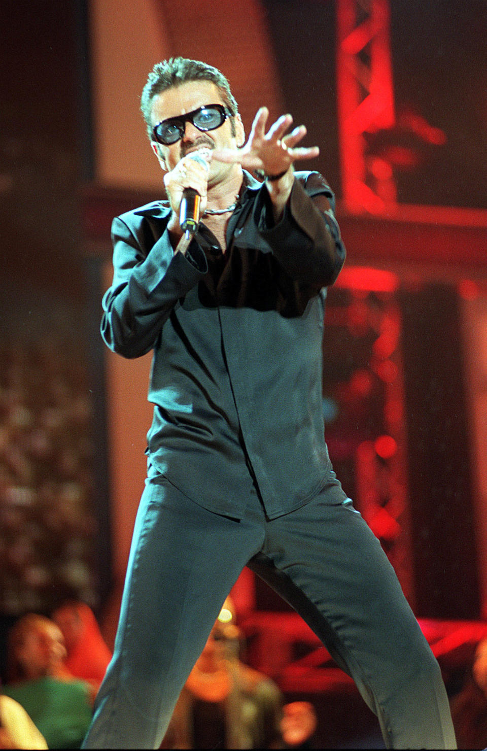 This picture can only be used in conjunction with editorial on NetAid: Singer George Michael performing on stage at the charity NetAid concert, at Wembley Stadium. 