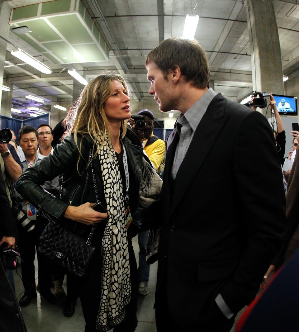 Tom Brady and Gisele Bundchen talk after Brady's Patriots lost to the New York Giants in Super Bowl 46 in Indianapolis in 2012.