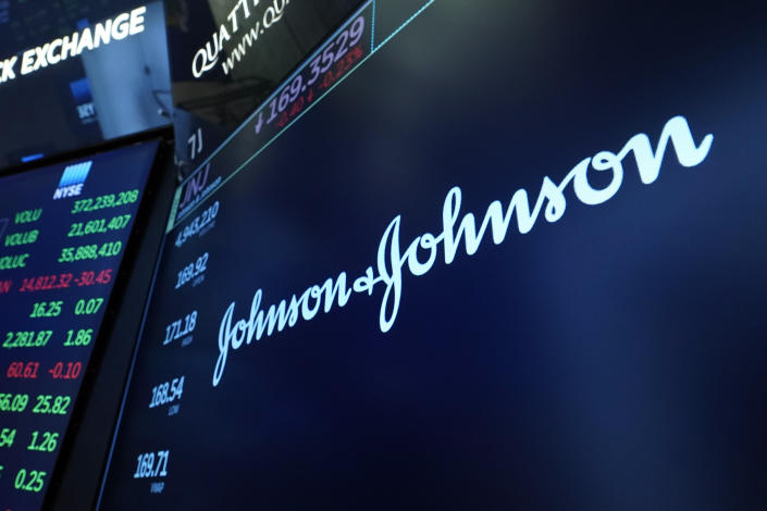 FILE - The Johnson & Johnson logo appears above a trading post on the floor of the New York Stock Exchange, Monday, July 12, 2021. Johnson & Johnson reports earnings on Tuesday, April 18, 2023. (AP Photo/Richard Drew, file)