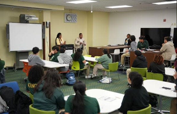 Passaic students during training of election workers. They stand to make $300 working on Election Day