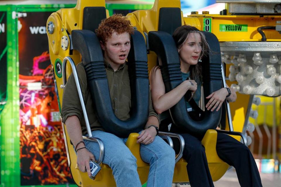 The spinning ride Insomniac appears to have put Tribune reporters John Lynch and Chloe Jones through the wringer during a visit to the Mid-State Fair on July 20, 2023.