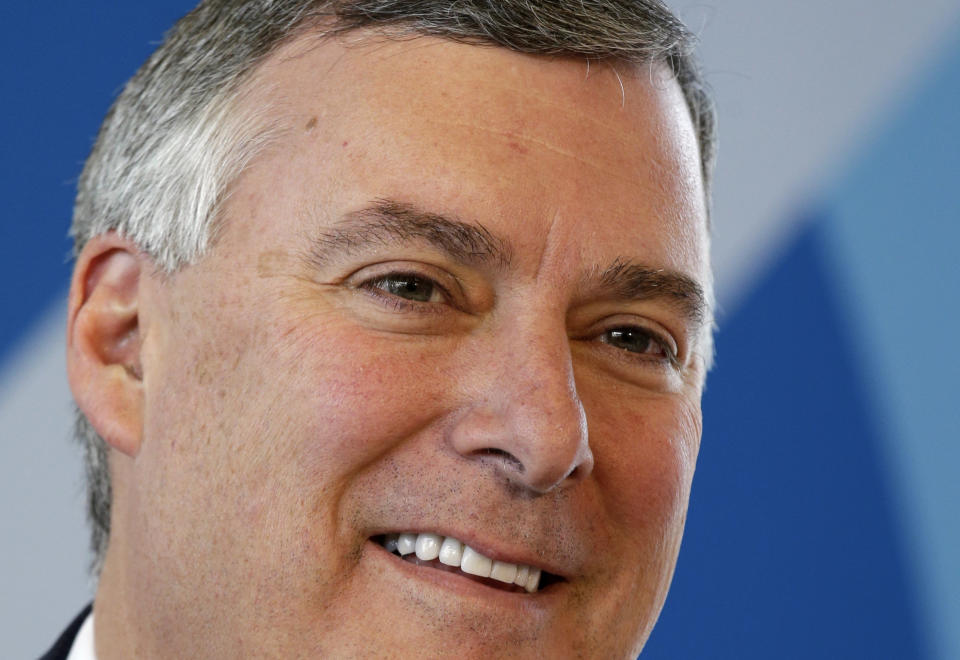 FILE - In this Sept. 25, 2017, file photo Boeing's Kevin McAllister listens during a news conference before a delivery ceremony for a new Boeing 747-8 freighter to Qatar Airways in Everett, Wash. Boeing said Tuesday, Oct. 22, 2019, that McAllister is out as chief executive of Boeing Commercial Airplanes. He’s being replaced Stanley Deal, who has been leading the company’s services division. (AP Photo/Elaine Thompson)