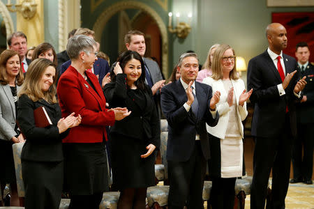 Canada's Minister of Foreign Affairs Chrystia Freeland, Minister of Employment, Workforce Development and Labour Patricia Hajdu, Minister of Status of Women Maryam Monsef, Minister of International Trade Francois-Philippe Champagne, Minister of Democratic Institutions Karina Gould and Minister of Immigration, Refugees and Citizenship Ahmed Hussen take part in a cabinet shuffle at Rideau Hall in Ottawa, Ontario, Canada, January 10, 2017. REUTERS/Chris Wattie