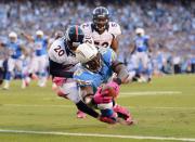 SAN DIEGO, CA - OCTOBER 15: Antonio Gates #85 of the San Diego Chargers dives into the endzone for a touchdown in the first quarter past Mike Adams #20 of the Denver Broncos during the NFL game at Qualcomm Stadium on October 15, 2012 in San Diego, California. (Photo by Harry How/Getty Images)