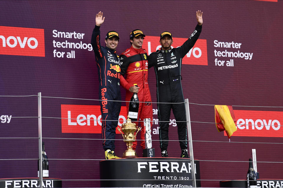 Sergio Perez, Carlos Sainz and Lewis Hamilton, pictured here on the podium after the British Grand Prix.