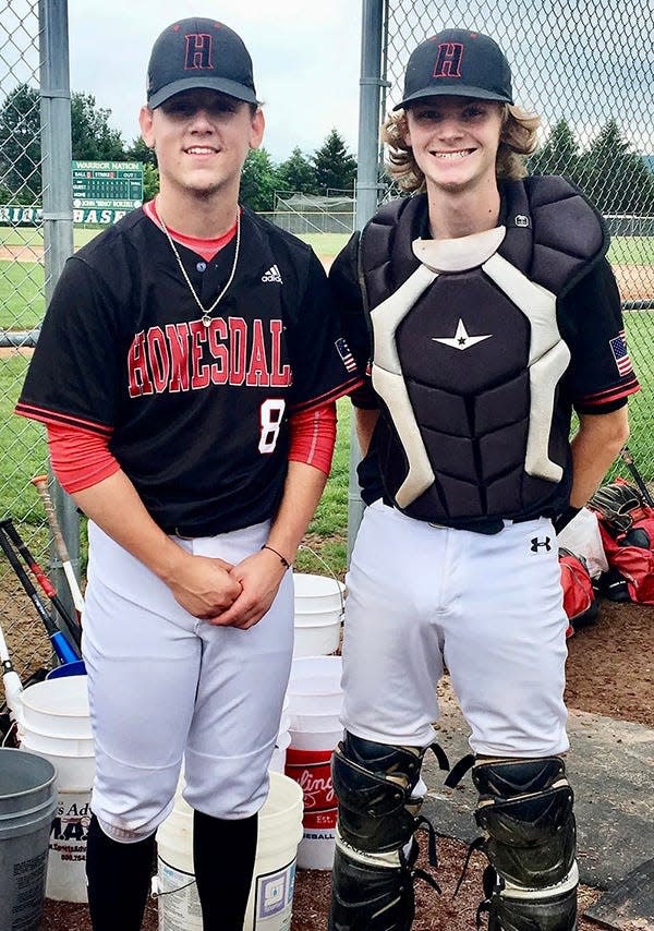 Honesdale ace Joseph Curreri prepares to take the mound just moments before a District 2 Class 4A playoff game. Curreri is pictured with Hornet catcher Garrett Tonkin.