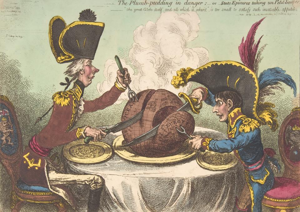 A cartoon depicting William Pitt, left, sitting at a table with Napoleon Bonaparte, right, both dressed in military uniform and hat, with each carving a large plum pudding on which is a map of the world, with Pitt's slice larger than Napoleon's.