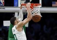 Feb 13, 2019; Boston, MA, USA; Boston Celtics forward Jayson Tatum (0) dunks against the Detroit Pistons during the second quarter at TD Garden. Winslow Townson-USA TODAY Sports