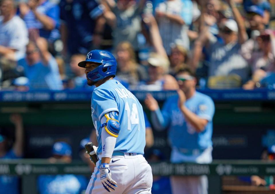 KC’s Edward Olivares watches his home run crash into a video board 452 feet away in deep left during Saturday’s game against the Washington Nationals at Kauffman Stadium.