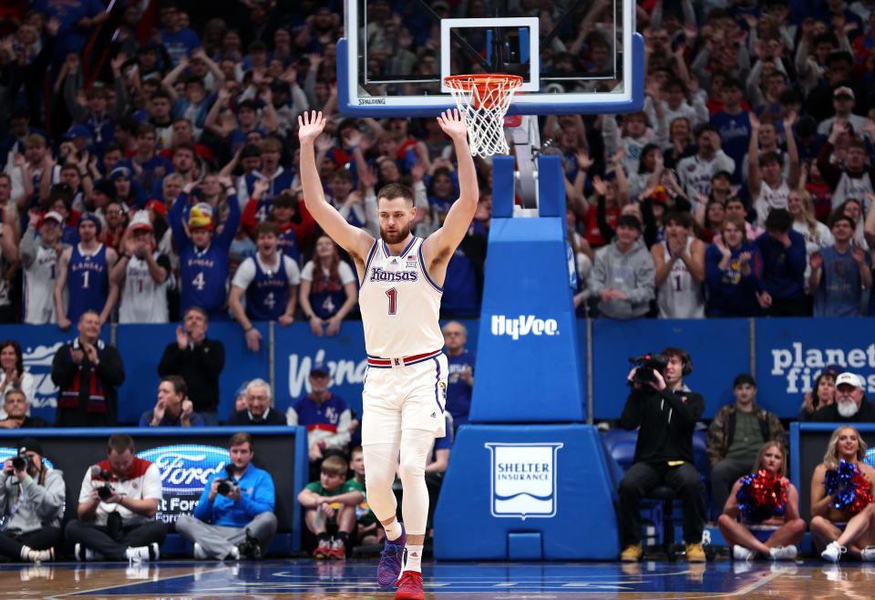 LAWRENCE, KANSAS - JANUARY 13: Hunter Dickinson #1 of the Kansas Jayhawks reacts after scoring during the 1st half of the game against the Oklahoma Sooners at Allen Fieldhouse on January 13, 2024 in Lawrence, Kansas. (Photo by Jamie Squire/Getty Images)