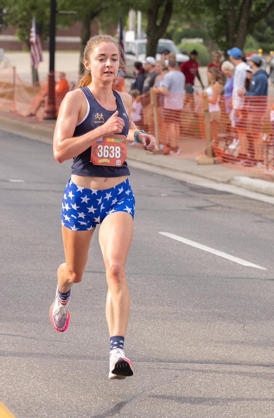 Abbey Warth from Indianapolis wins the women’s two-mile race Tuesday at the 45th annual North Canton YMCA two-mile walk/run and five-mile run.