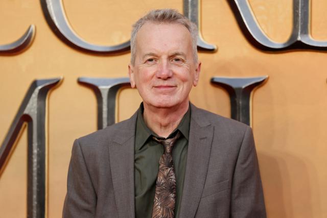 British comedian Frank Skinner poses on the red carpet after arriving to attend the World Premiere of the film 
