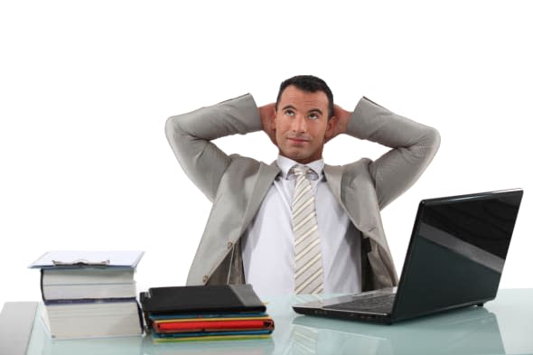 office worker stretching at his ...