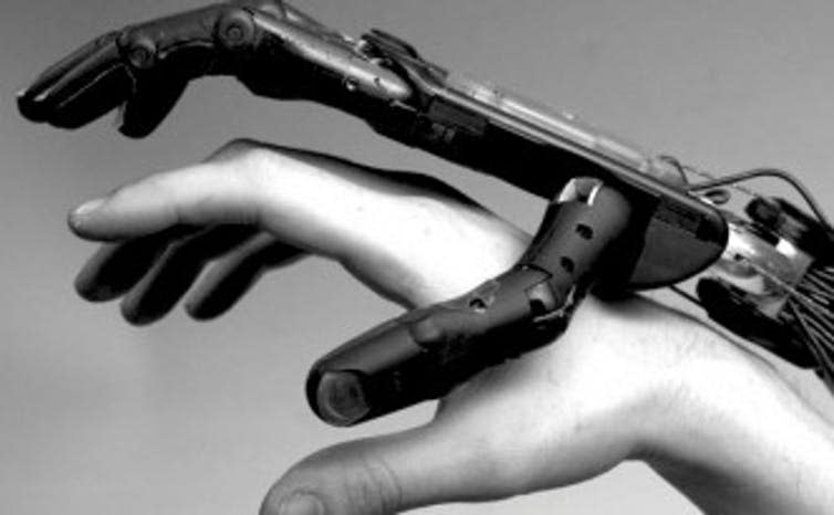 <span class="caption">Comparison of a human hand with a robotic one.</span> <span class="attribution"><a class="link " href="http://www.shadowrobot.com/wp-content/uploads/2012/12/Human-and-Hand-332x205.jpg" rel="nofollow noopener" target="_blank" data-ylk="slk:Wikimedia;elm:context_link;itc:0;sec:content-canvas">Wikimedia</a>, <a class="link " href="http://creativecommons.org/licenses/by/4.0/" rel="nofollow noopener" target="_blank" data-ylk="slk:CC BY;elm:context_link;itc:0;sec:content-canvas">CC BY</a></span>