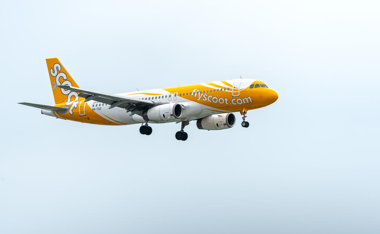 Ho Chi Minh City, Vietnam - July 29th, 2018: Flyscoot airplane A320 of Singapore Airlines landing at Tan Son Nhat International Airport in the afternoon in Ho Chi Minh City, Vietnam