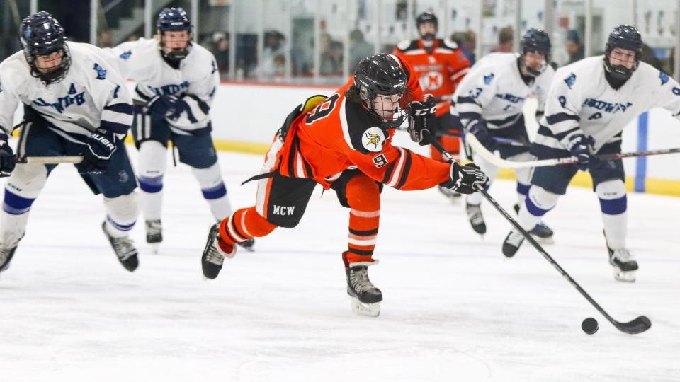 Middleboro's James Joyce handles the puck during a game against Sandwich at Gallo Ice Arena in Bourne on Wednesday, Feb. 7, 2024.