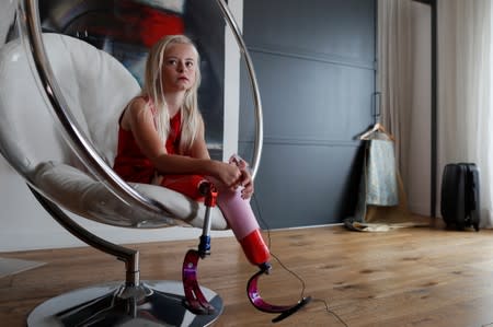 Model Daisy-May Demetre, 9 year-old double amputee who will walk the runway during Paris Fashion Week, poses for a photograph a day before the luxury children's wear label Lulu et Gigi show in Paris