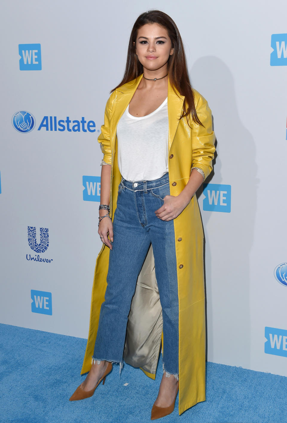 Wearing The Row trench and Vetements jeans at WE Day California in April 2016