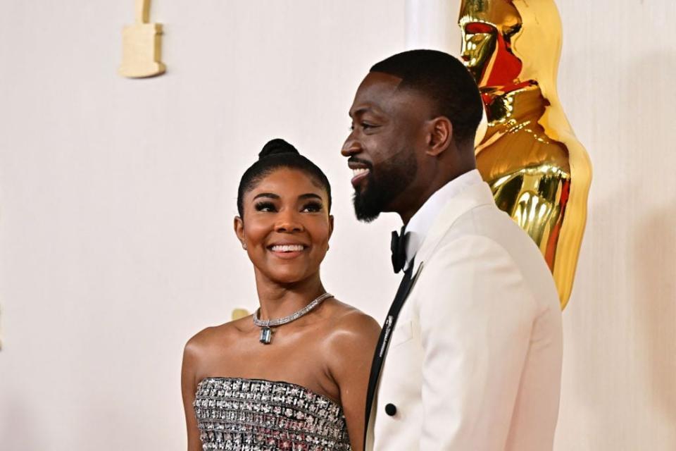 Actress Gabrielle Union and her husband former NBA star Dwyane Wade attend the 96th Academy Awards.