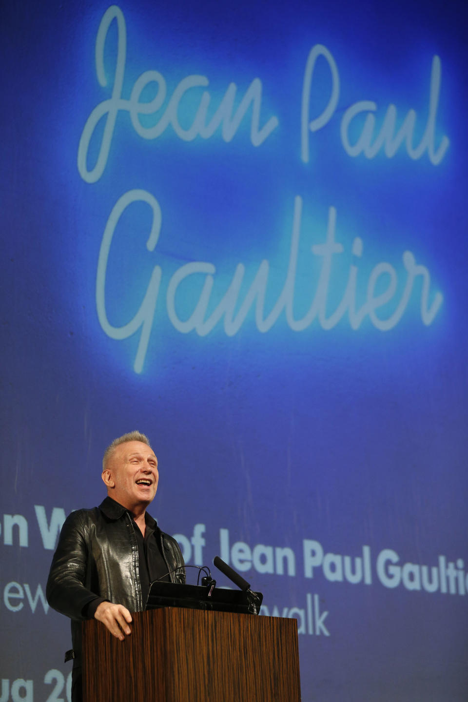 French couturier Jean Paul Gaultier speaks to the media during a Q&A session during the launch his exhibition 'The Fashion World of Jean Paul Gaultier : From the Sidewalk to the Catwalk' at the Barbican Art Gallery in London, Tuesday, April 8, 2014. (AP Photo/Sang Tan)