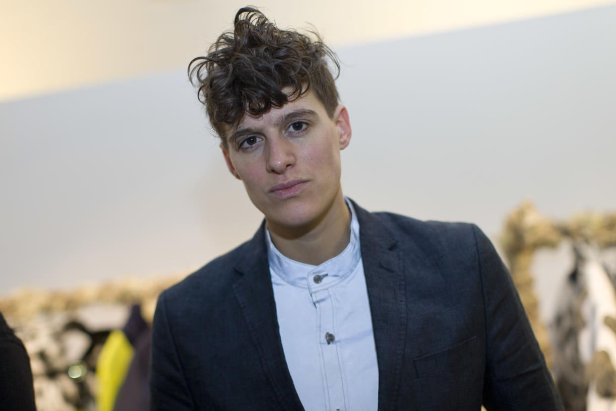 Androgynous model Rain Dove poses for a portrait in the London Fashion Week venue in Soho in central London on in February 2016. 