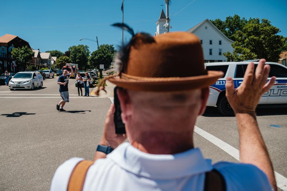 Sugarcreek Police Patrolman Michael Sherry runs his leg of the Law Enforcement Torch Run for Special Olympics, Thursday, June 23 in Tuscarawas County.