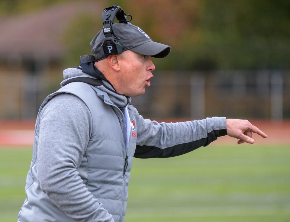 Morton head coach Adam O'Neill instructs the Potters as they battle New Lenox Providence in the second half of their Class 5A state football playoff game Saturday, Oct. 28, 2023 in Morton.