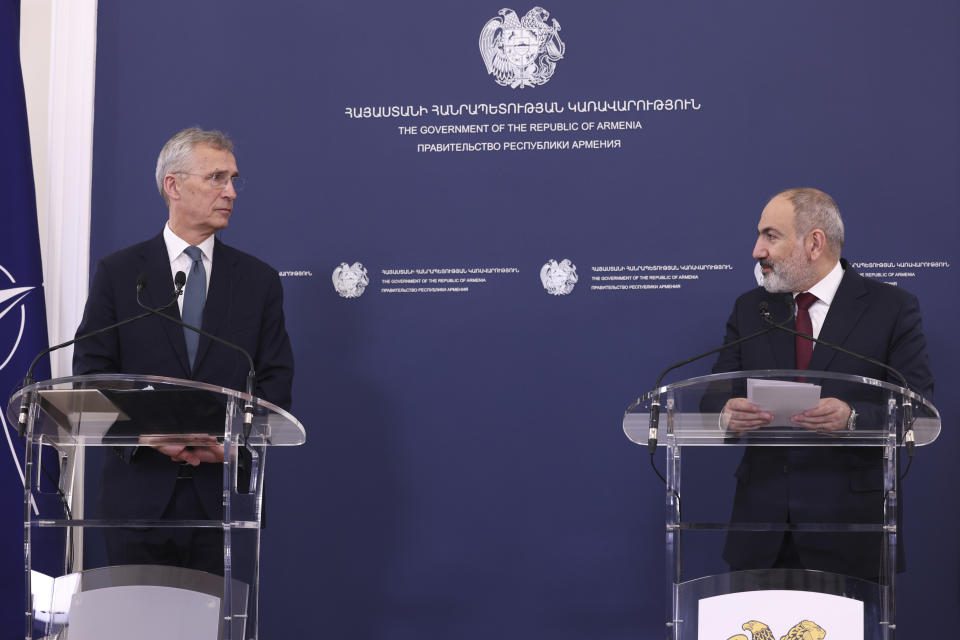 Armenia's Prime Minister Nikol Pashinyan, right, and NATO Secretary General Jens Stoltenberg make a joint statements after their meeting in Yerevan, Armenia, Tuesday, March 19, 2024. (Stepan Poghosyan/Photolure via AP)