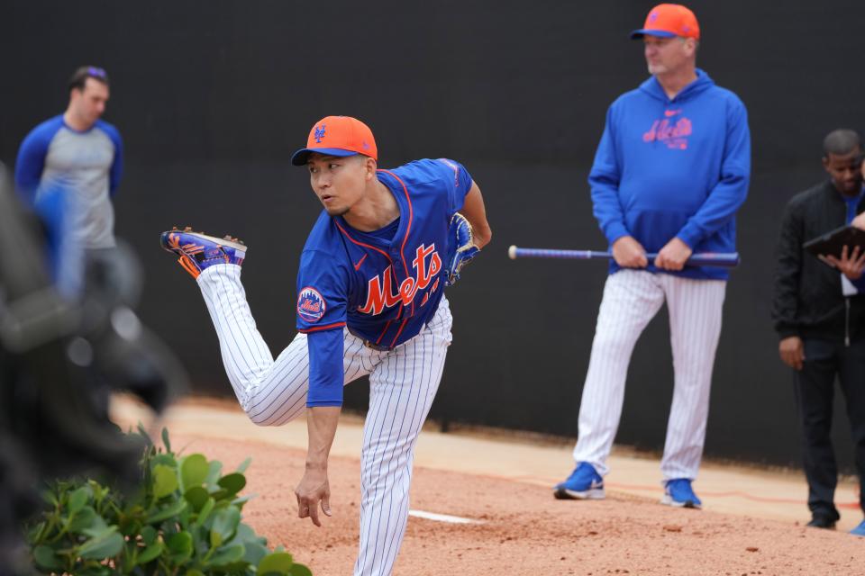 Kodai Senga warms up during a Feb. 19 workout at the Mets' spring training facility in Port St. Lucie, Florida.