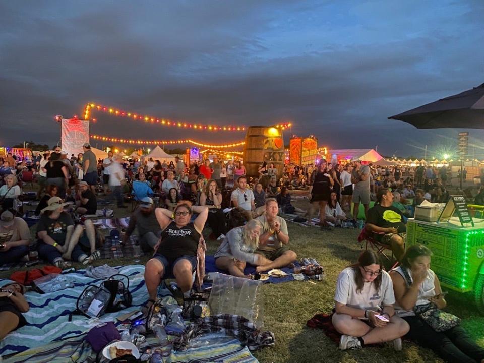 A large crowd covered the back lawn at The Highlands Festival Grounds after sunset on Saturday night of Bourbon & Beyond.