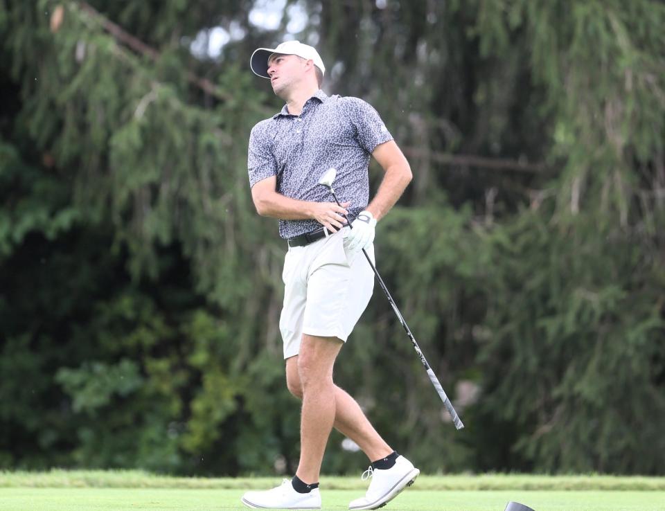 Jake Erickson watches his tee shot on No. 9 during the final round of the Men's City golf tournament at Panther Creek Country Club on Sunday, August 6, 2023.