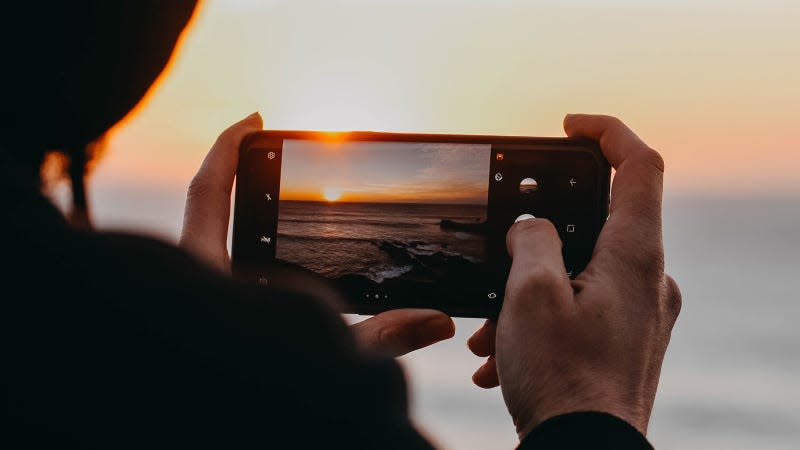 person holding an iphone