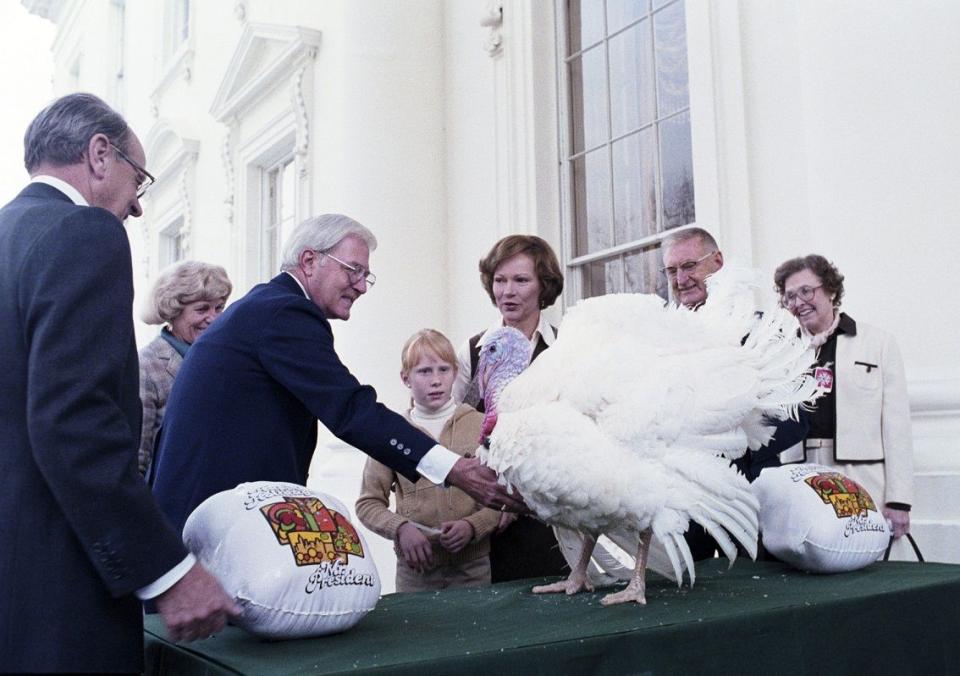 Rosalynn Carter and Amy Carter pardoning a turkey on Nov. 21, 1978. (Photo: Jimmy Carter Presidential Library & Museum)