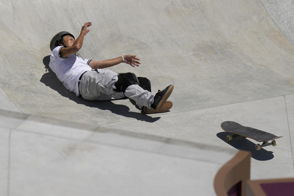 Ayumu Hirano of Japan falls while competing in the men's park skateboarding prelims at the 2020 Summer Olympics, Thursday, Aug. 5, 2021, in Tokyo, Japan. (AP Photo/Ben Curtis)