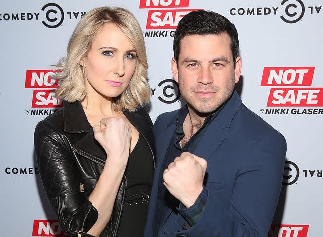 <p>Jesse Grant/Getty</p> Nikki Glaser and Chris Convy attend the "Not Safe With Nikki Glaser" Season One Premiere Party on February 8, 2016 in West Hollywood, California.