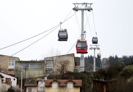 The Trebevic cable car is seen above the city of Sarajevo during a test drive following the restoration of the line after 26 years, Bosnia and Herzegovina, April 4, 2018. Picture taken April 4, 2018. REUTERS/Dado Ruvic