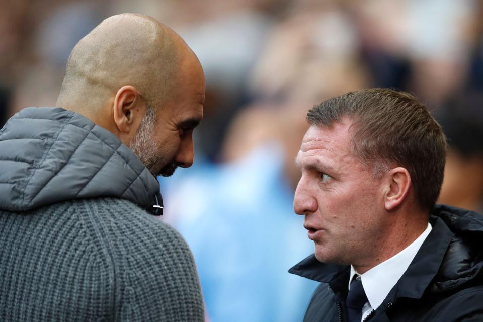 Pep Guardiola’s Manchester City take on Brendan Rodgers’ Leicester (Martin Rickett/PA) (PA Archive)