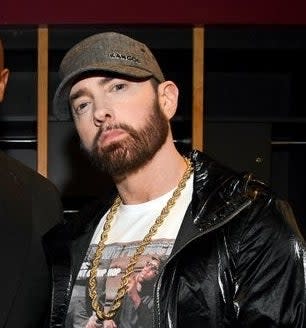 Dr. Dre and Eminem pose backstage during the 36th Annual Rock & Roll Hall Of Fame Induction Ceremony at Rocket Mortgage Fieldhouse on October 30, 2021 in Cleveland, Ohio