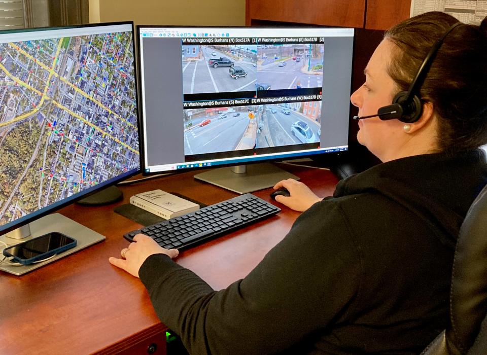 Staci Arch, a civilian Watch Center officer with Hagerstown Police, keeps an eye on some of the live footage from city surveillance cameras on March 5, 2024. The map on the left identifies where the city has surveillance cameras.