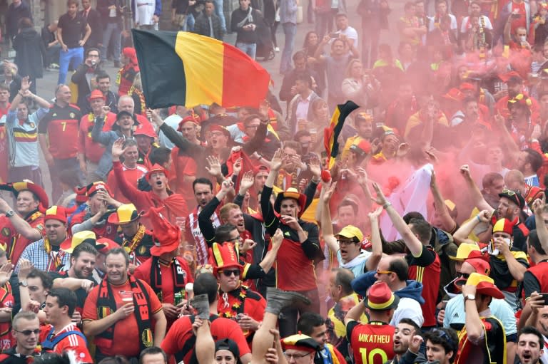 Belgium supporters cheer at La Grand Place in Lille on July 1, 2016 ahead of the Euro 2016 match between Belgium and Wales