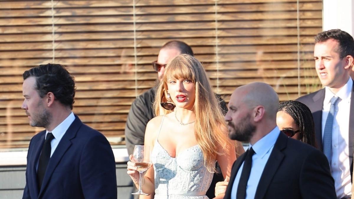 See Taylor Swift Do Wedding Guest Dressing in a Lacy Black Skirt