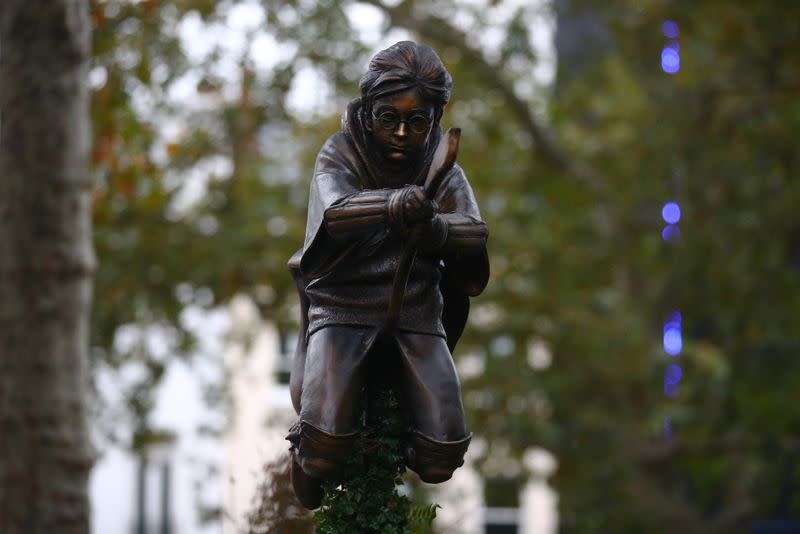 A statue of Harry Potter, based on the JK Rowling novels, is seen after it was unveiled at Leicester Square in London