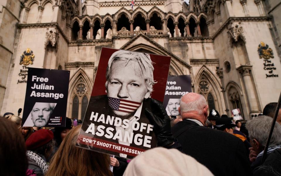 Assange demonstrators outside the Royal Courts of Justice in London