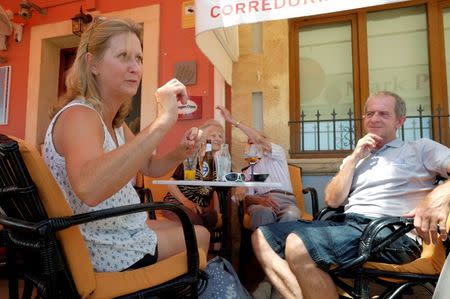 British residents discuss in a restaurant after Britain voted to leave the European Union in the EU Brexit referendum in Javea near Alicante, Spain, June 24, 2016. REUTERS/Heino Kalis