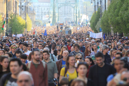 People protest against Prime Minister Viktor Orban's efforts to force a George Soros-founded university out of the country in Budapest, Hungary, April 2, 2017. REUTERS/Bernadett Szabo