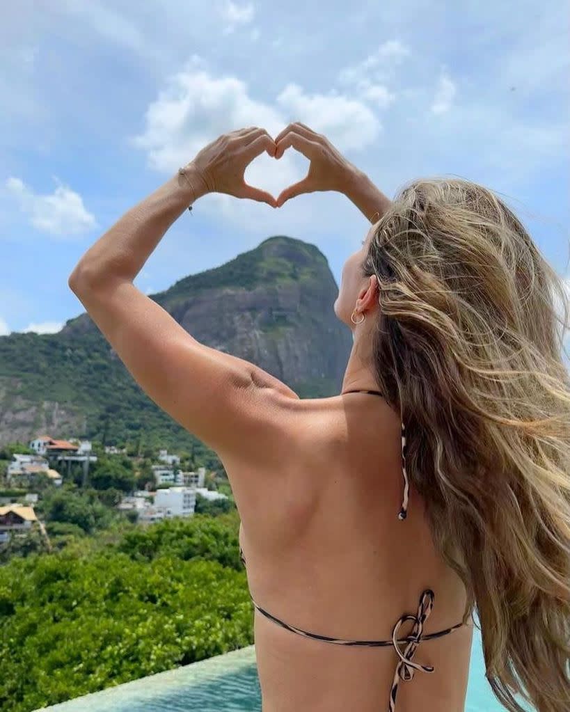 Gisele showcases her toned physique in string bikini